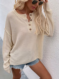 buttoned exposed seam high low sweater