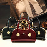 glossy patent leather handbag
