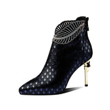 peacock pattern embossed leather ankle boot