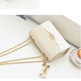 ribbon with pearl tassel square chained crossbody bag