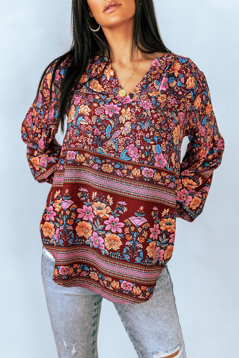 bohemian notched neck balloon sleeve floral blouse