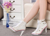 pointed toe rivets on canvas denim lace up high heeled ankle boots