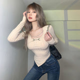 chain pointed hem long sleeve ribbed blouse